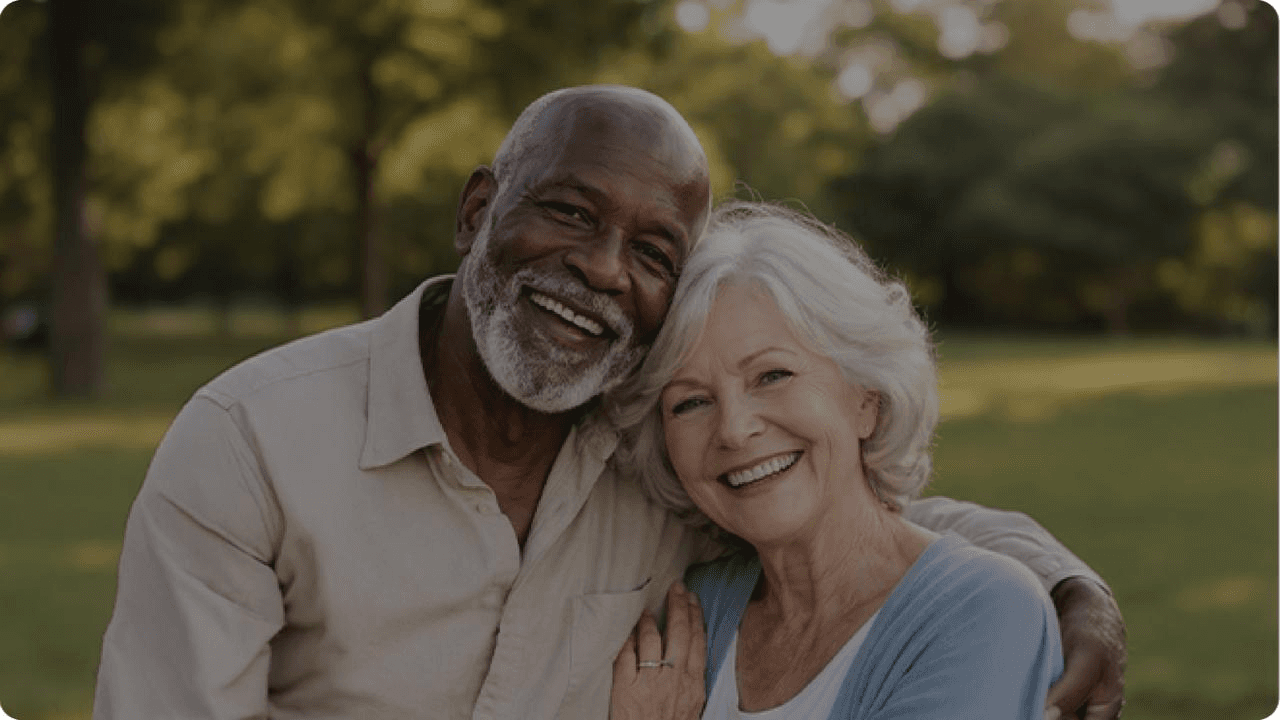 Smiling senior couple in a park